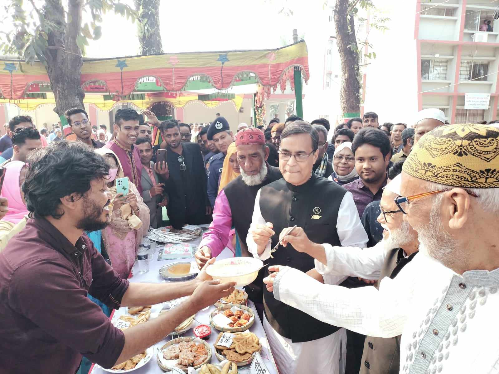 নারীদের তৈরি পিঠায় নেত্রকোনায় বসন্ত উৎসব পালিত